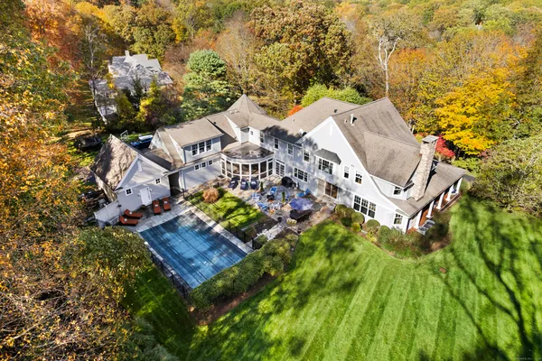 an aerial view of a house with a garden