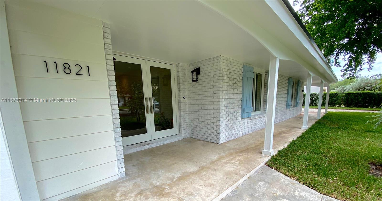 11821 Southwest 81st Road, Unit 11821 Pinecrest, FL 33156 - Photo 2 of 14 a view of house with backyard