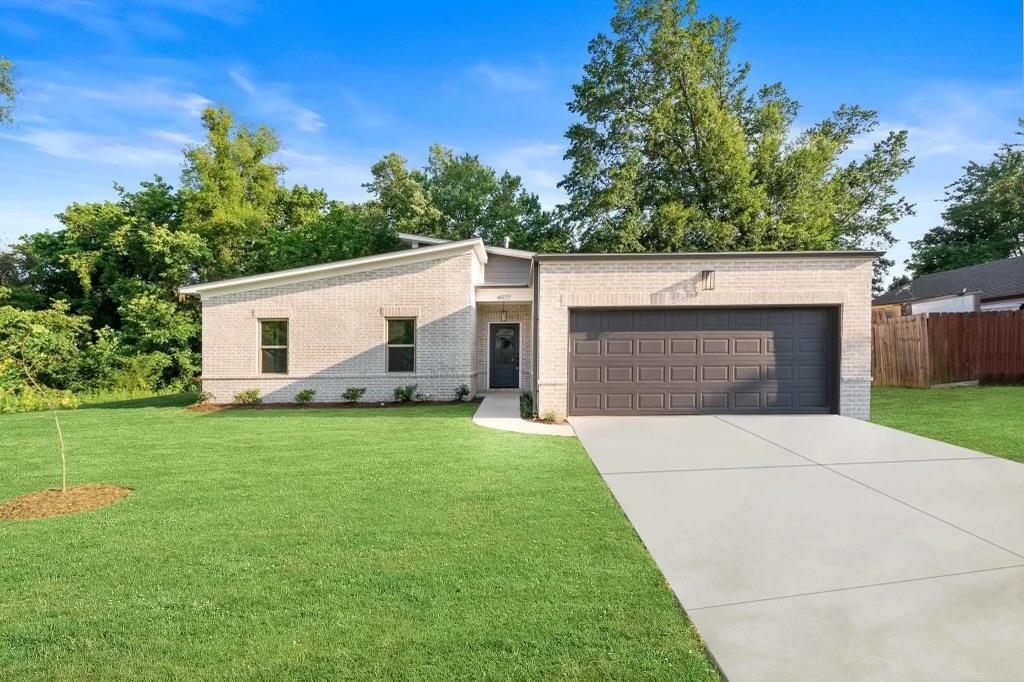4977 Chevron Road Memphis, TN 38118 - Photo 18 of 19 a view of a backyard with a garden