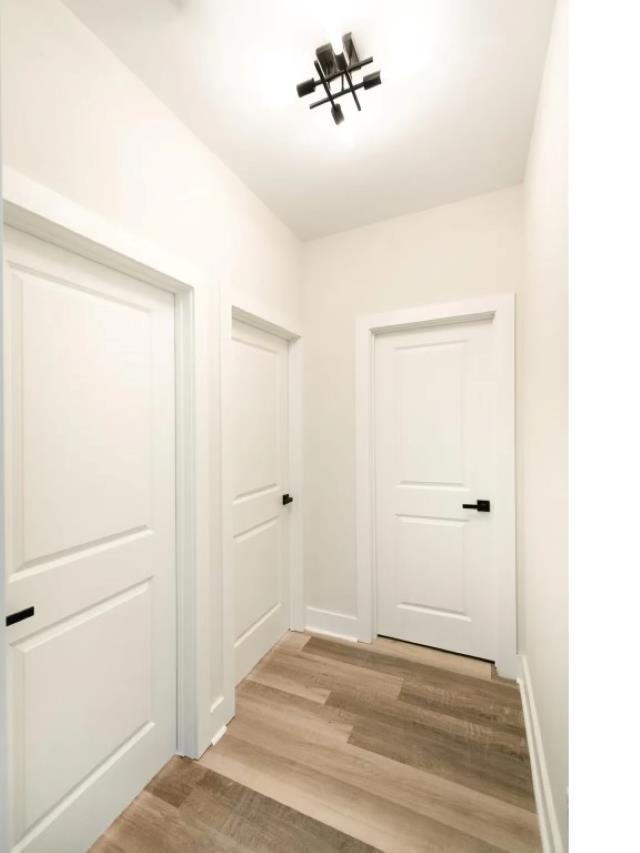 4977 Chevron Road Memphis, TN 38118 - Photo 5 of 19 a view of a livingroom with wooden floor and closet