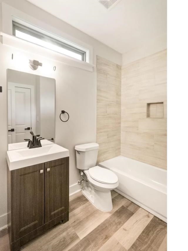 4977 Chevron Road Memphis, TN 38118 - Photo 10 of 19 a bathroom with a sink a toilet and shower