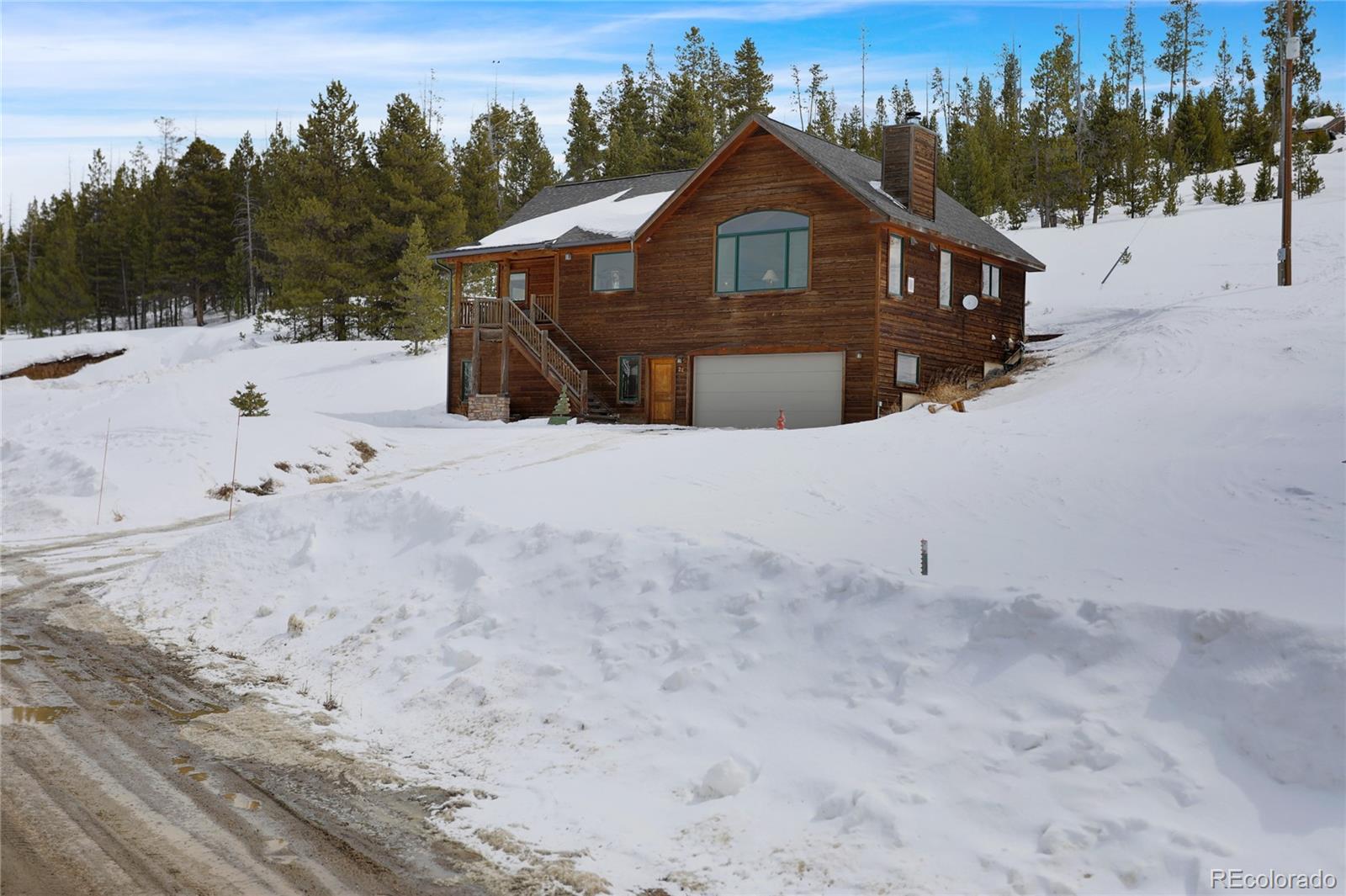 20 County Road 523 Tabernash, CO 80478 - Photo 2 of 32 a front view of a house with a yard