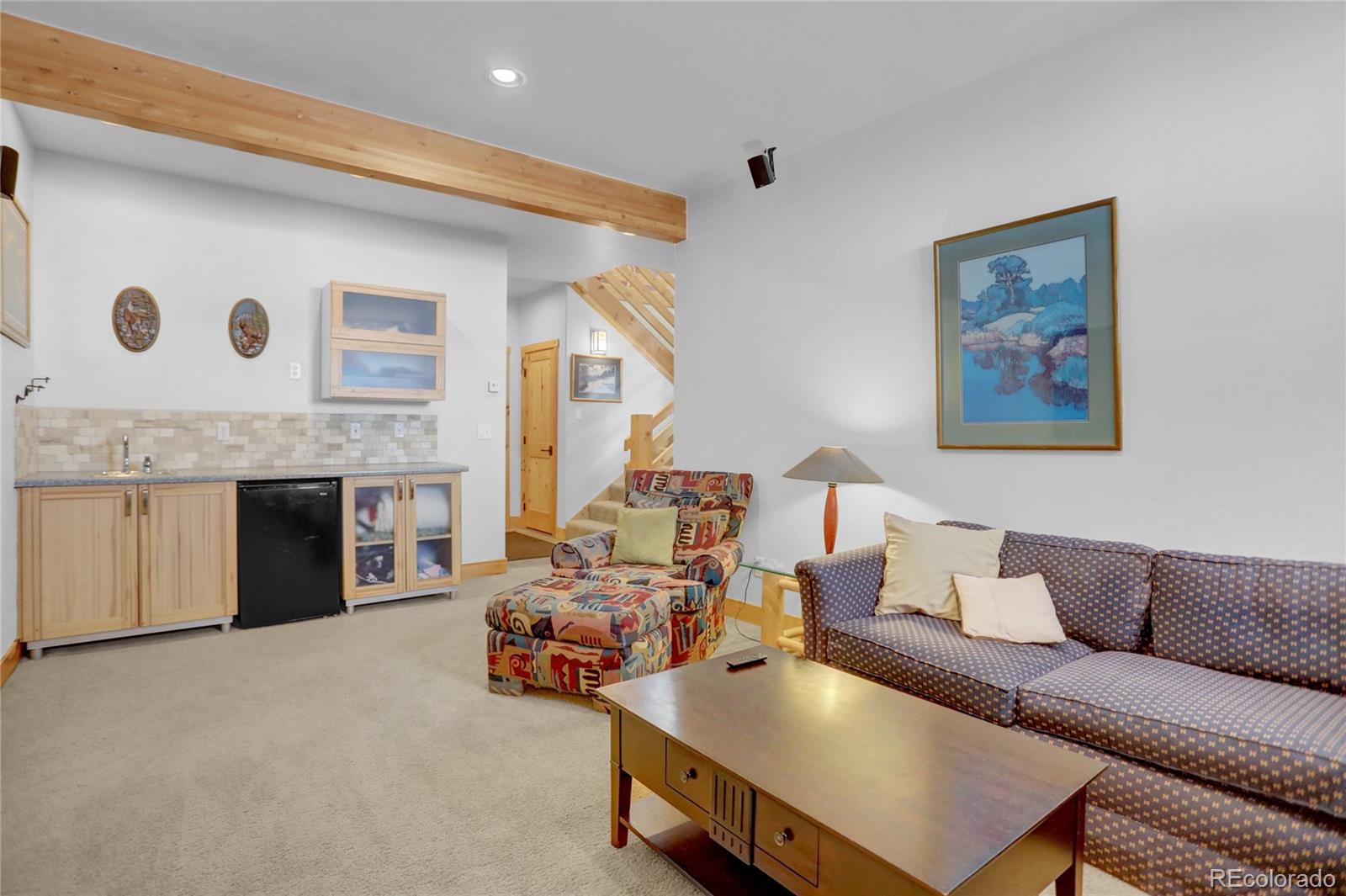 20 County Road 523 Tabernash, CO 80478 - Photo 21 of 32 a living room with furniture and a fireplace