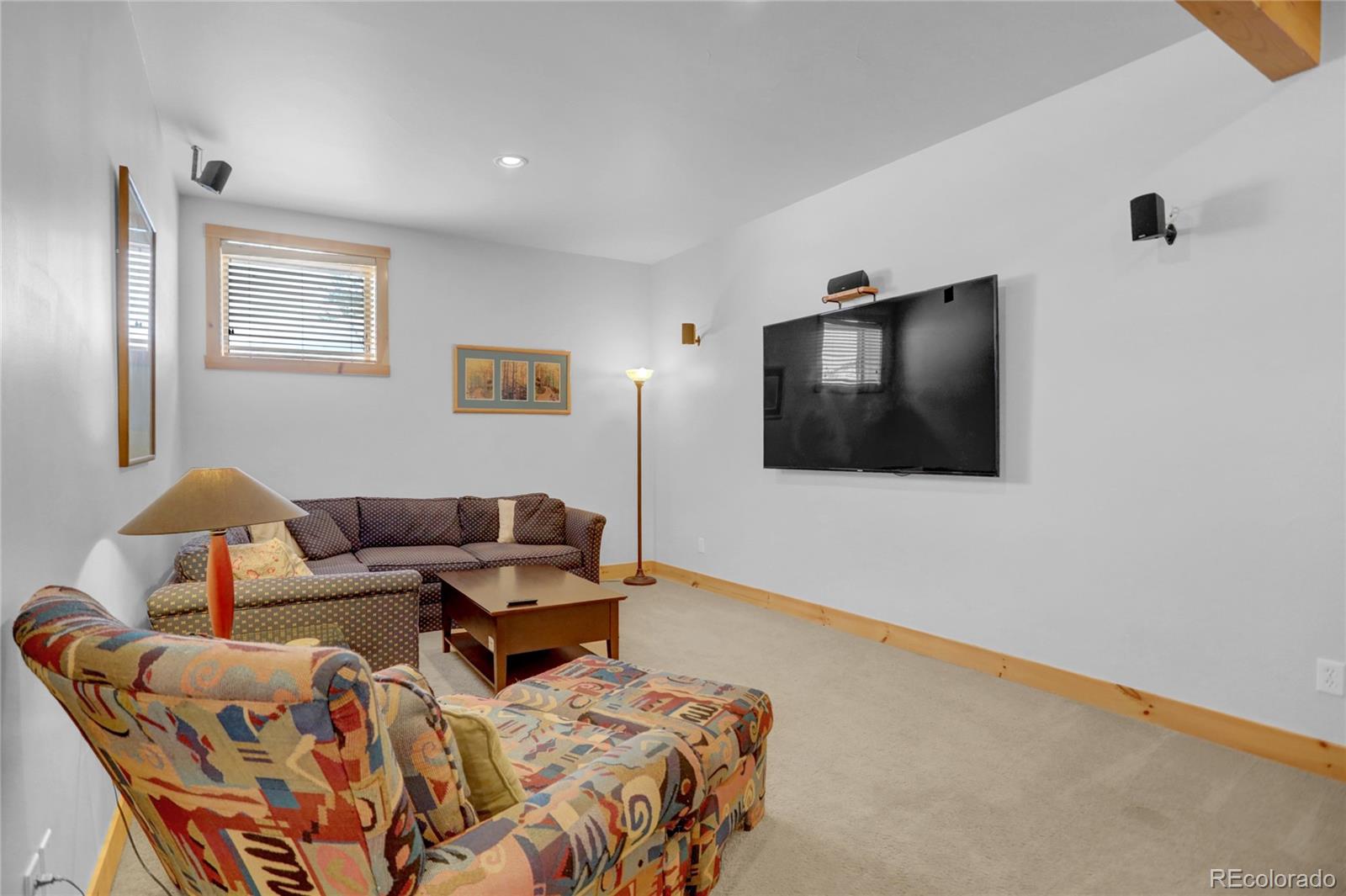 20 County Road 523 Tabernash, CO 80478 - Photo 22 of 32 a bedroom with a bed and flat screen tv