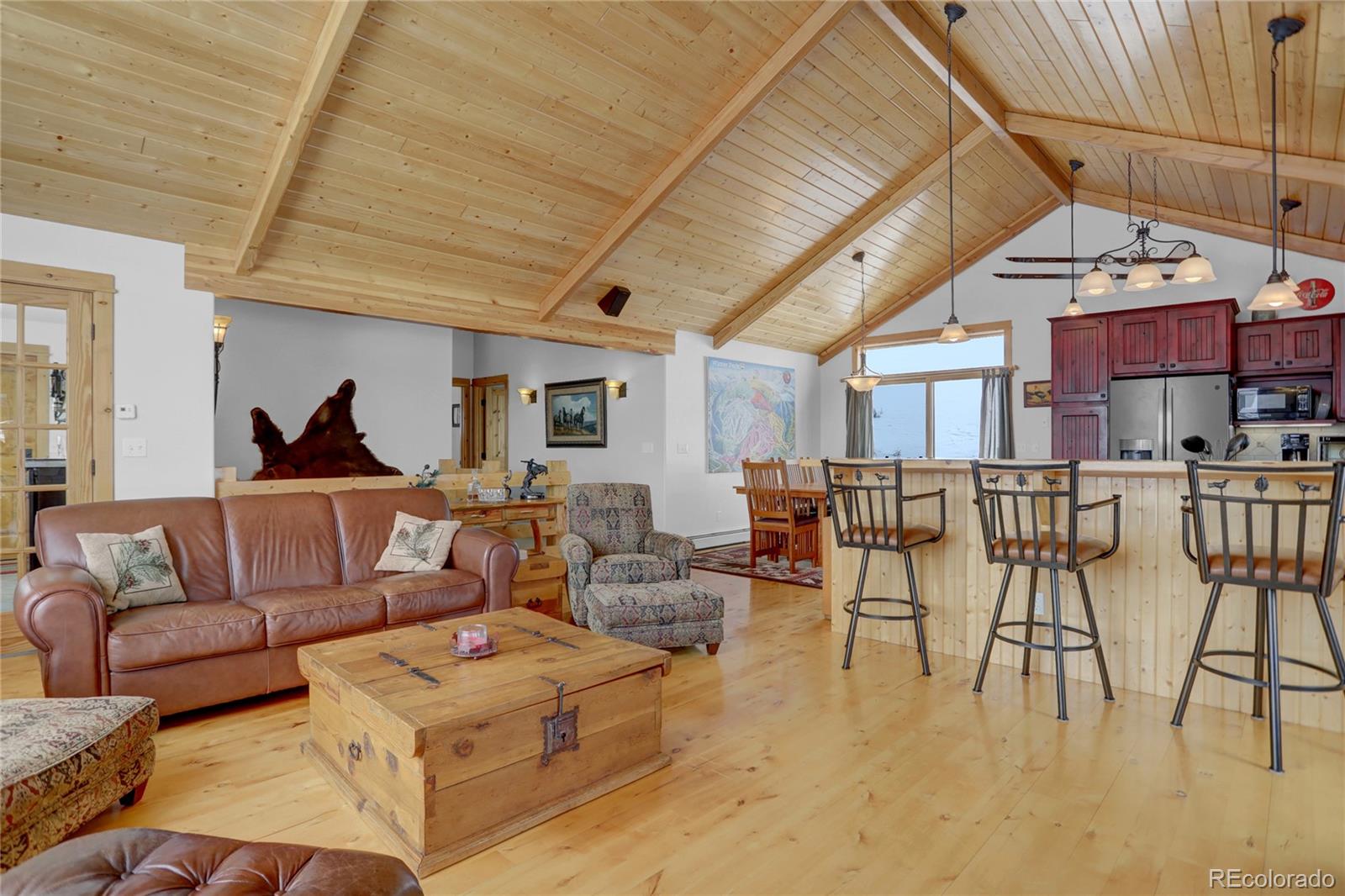 20 County Road 523 Tabernash, CO 80478 - Photo 6 of 32 a living room with furniture and a chandelier