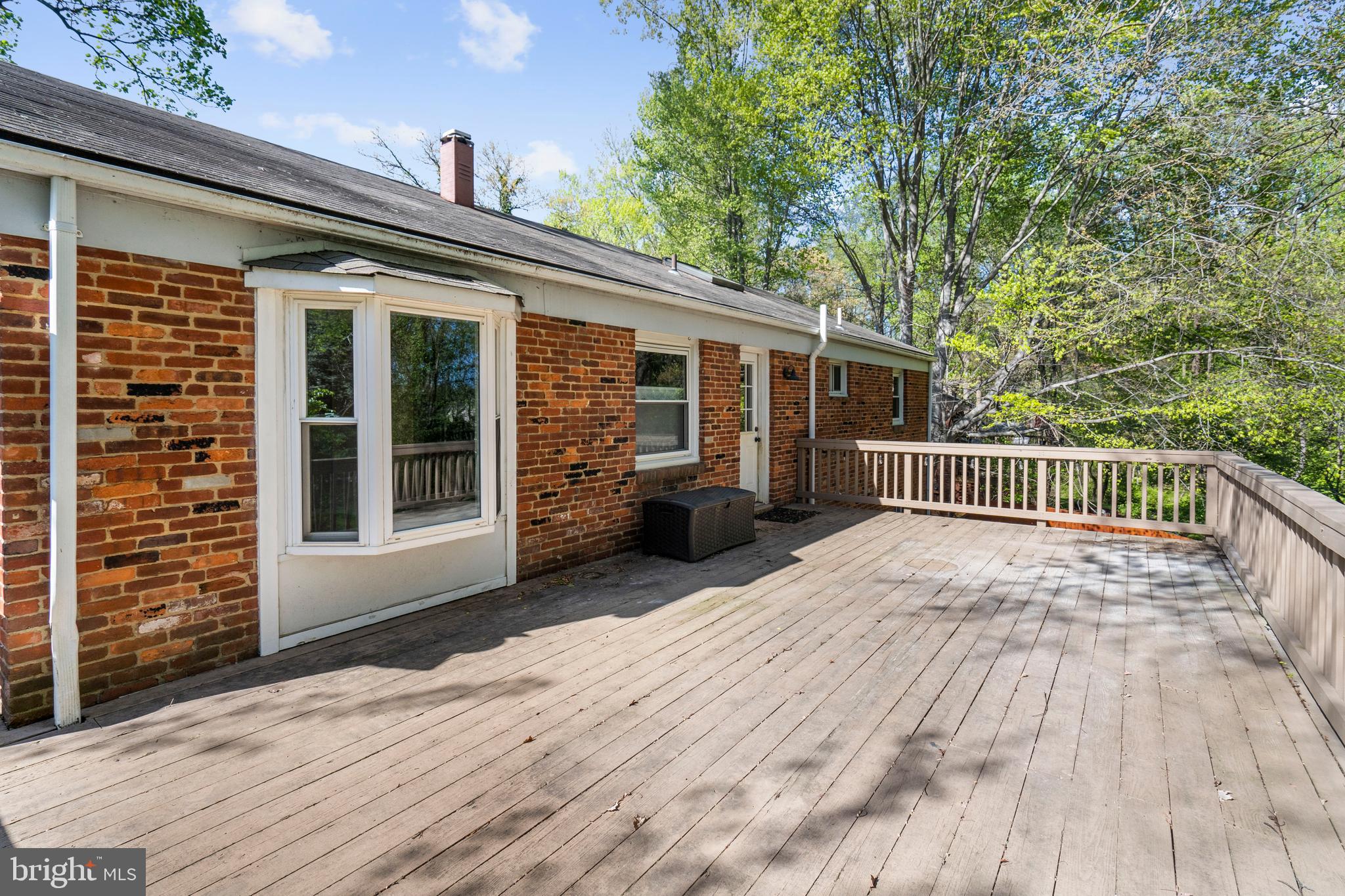 1603 Kirby Road McLean, VA 22101 - Photo 14 of 38 a view of backyard with deck and wooden floor