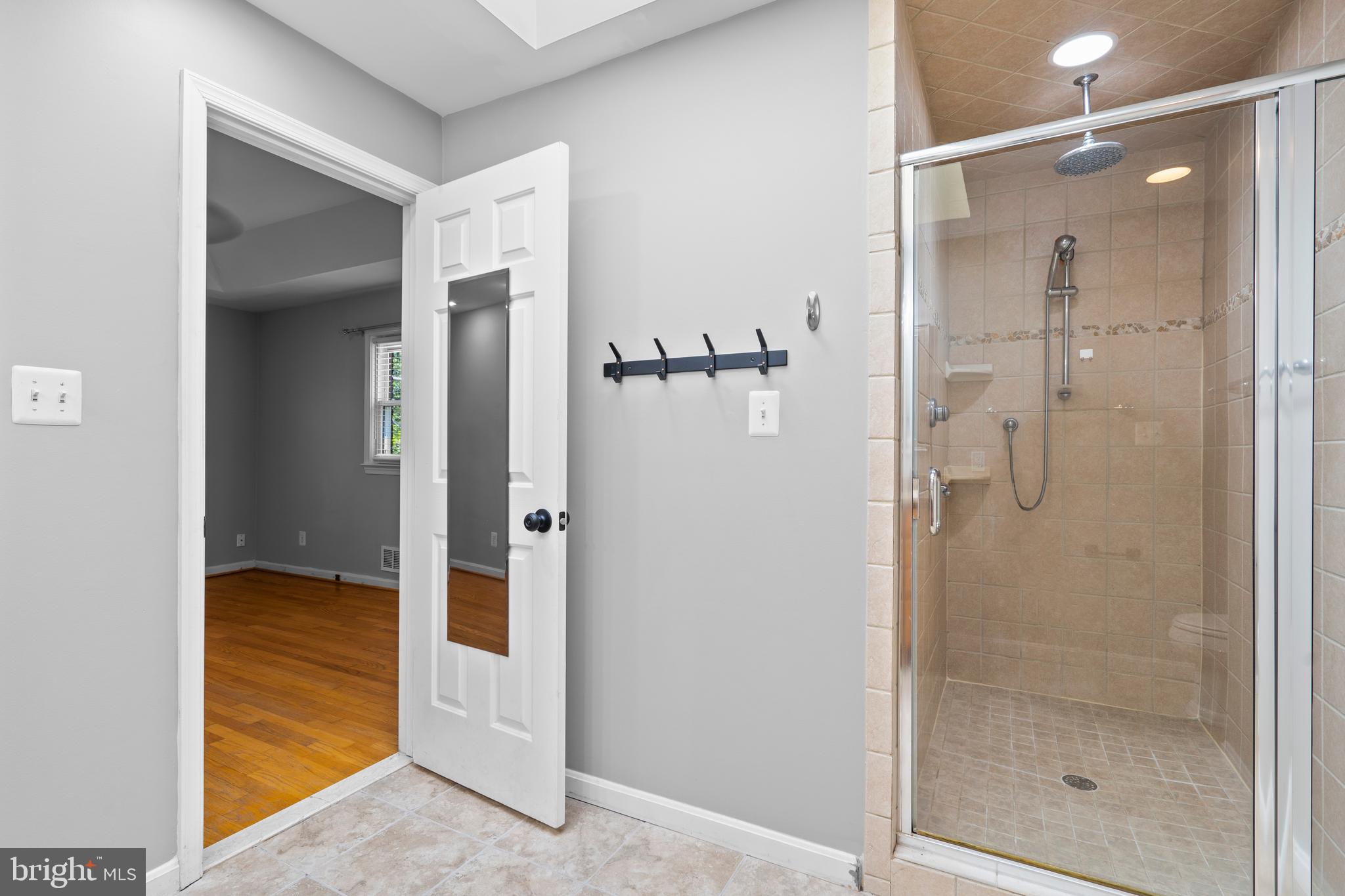 1603 Kirby Road McLean, VA 22101 - Photo 19 of 38 a bathroom with a shower and a sink