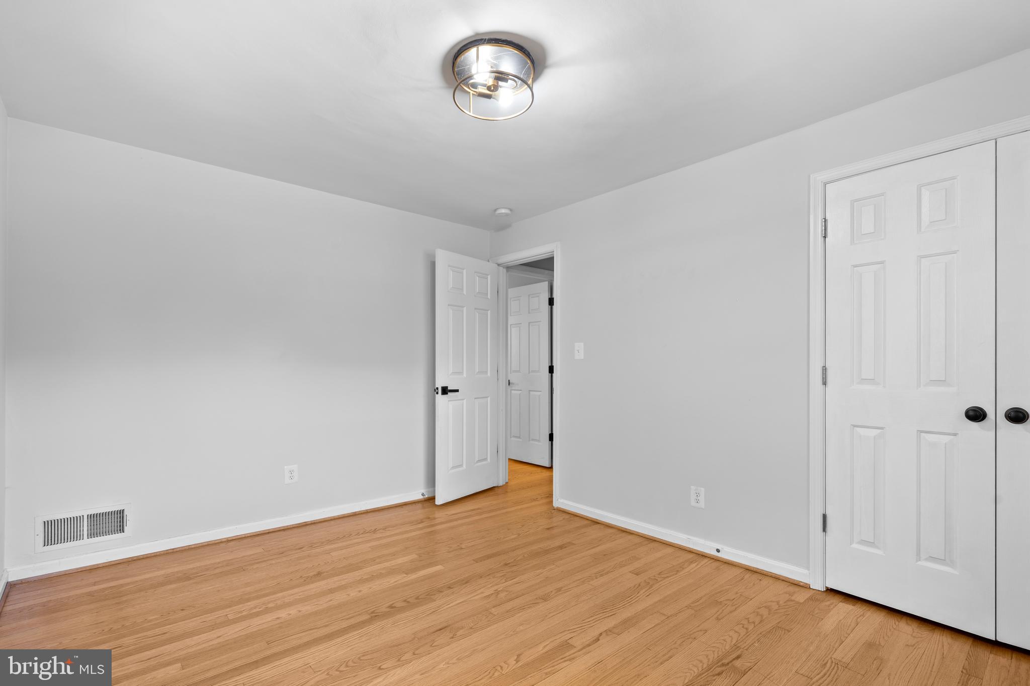 1603 Kirby Road McLean, VA 22101 - Photo 22 of 38 a view of room with wooden floor