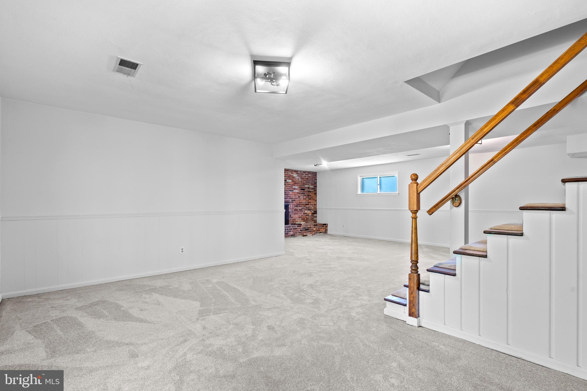 1603 Kirby Road McLean, VA 22101 - Photo 25 of 38 a view of an empty room with stairs