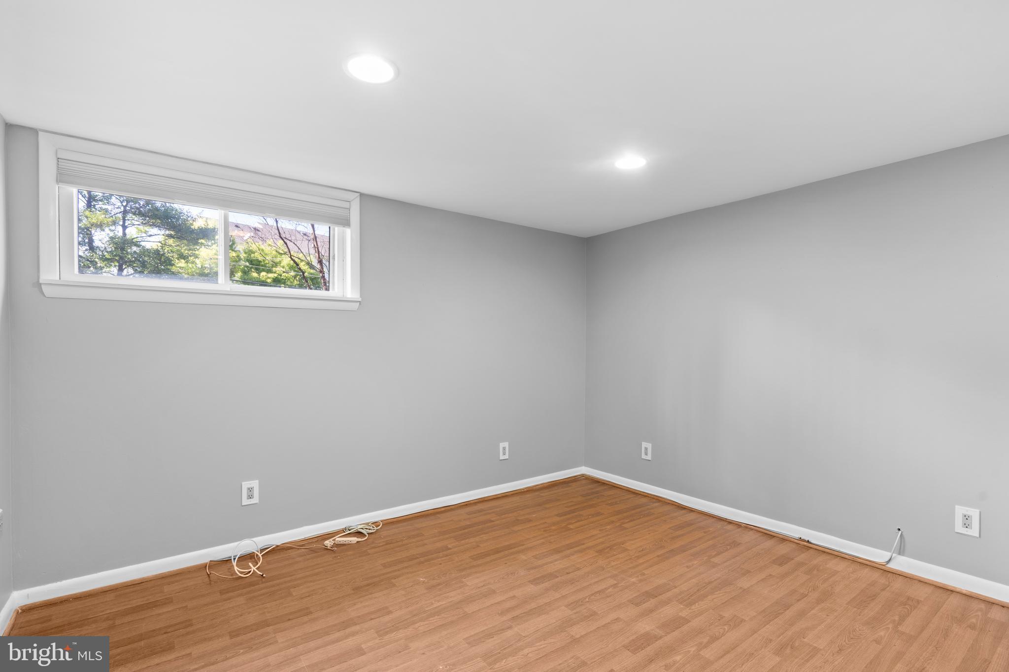 1603 Kirby Road McLean, VA 22101 - Photo 27 of 38 a view of empty room with wooden floor and fan