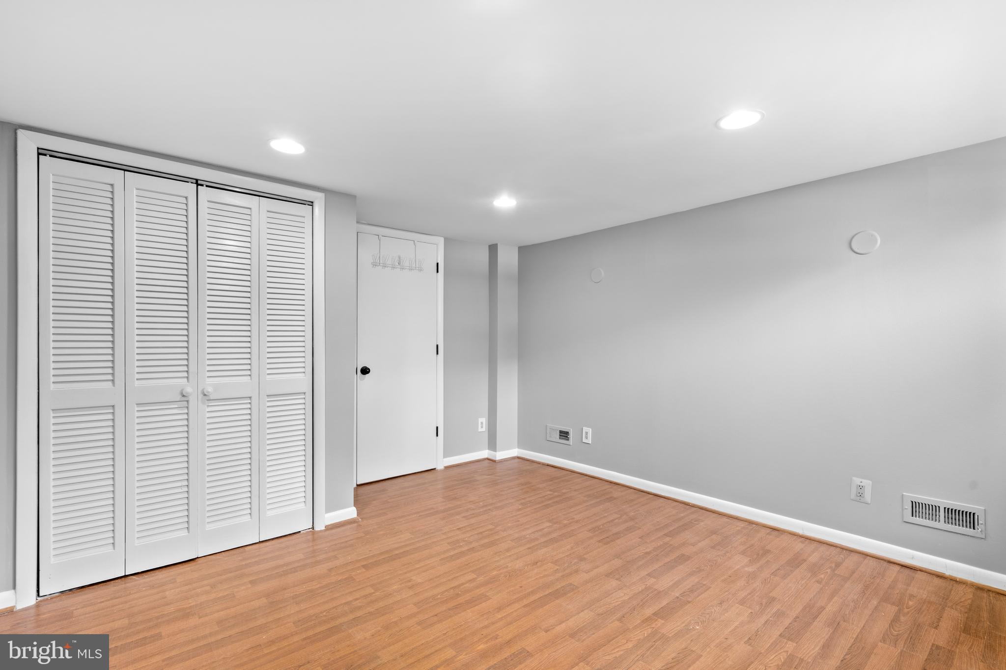 1603 Kirby Road McLean, VA 22101 - Photo 28 of 38 wooden floor in an empty room with a window
