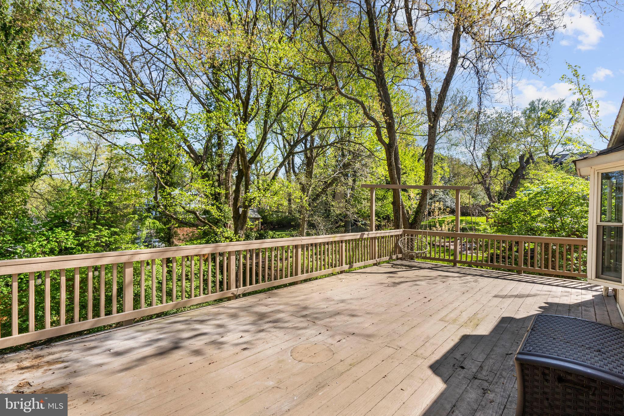 1603 Kirby Road McLean, VA 22101 - Photo 31 of 38 a view of a roof deck with wooden fence and floor
