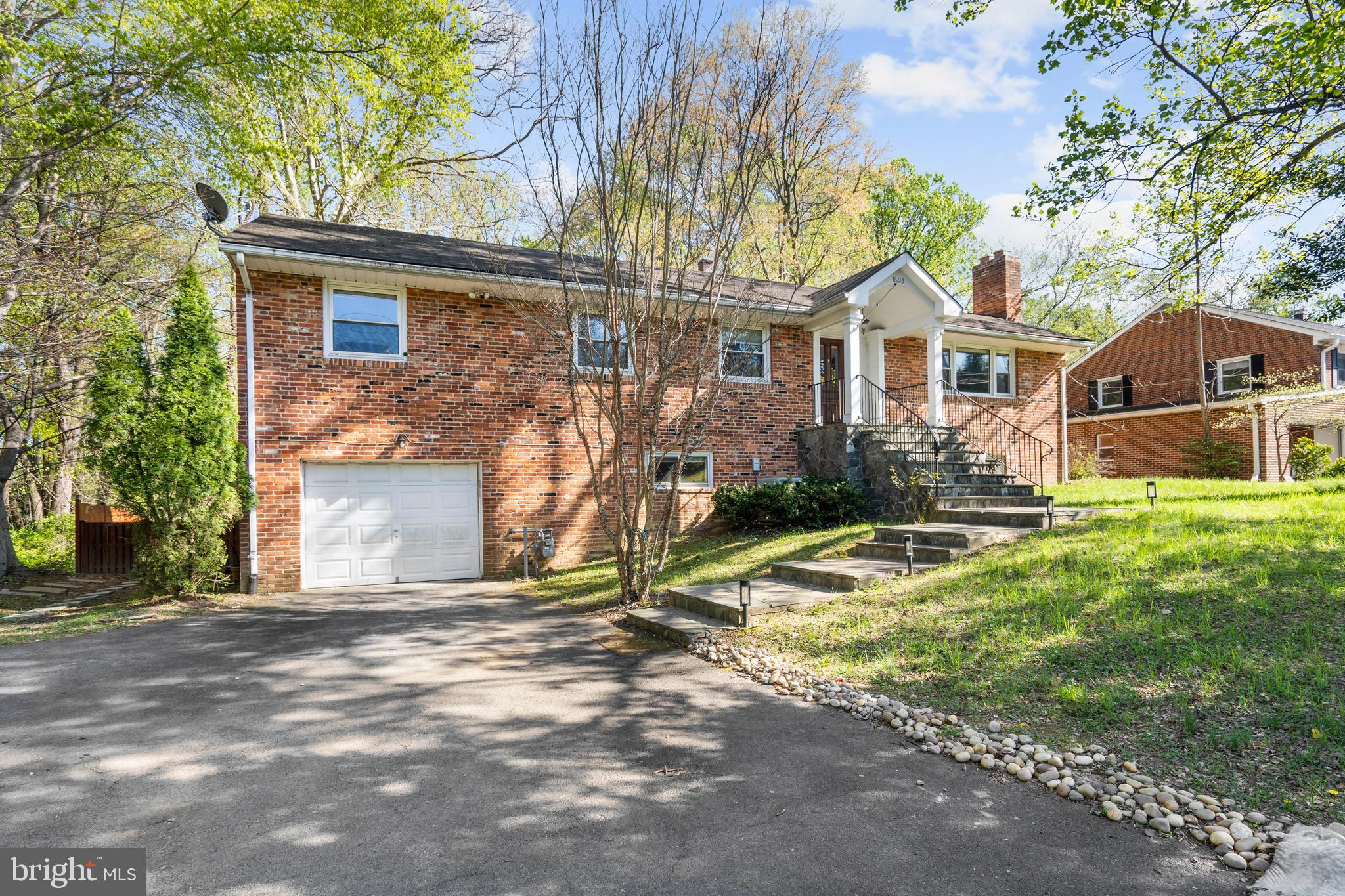 1603 Kirby Road McLean, VA 22101 - Photo 37 of 38 a front view of a house with a yard
