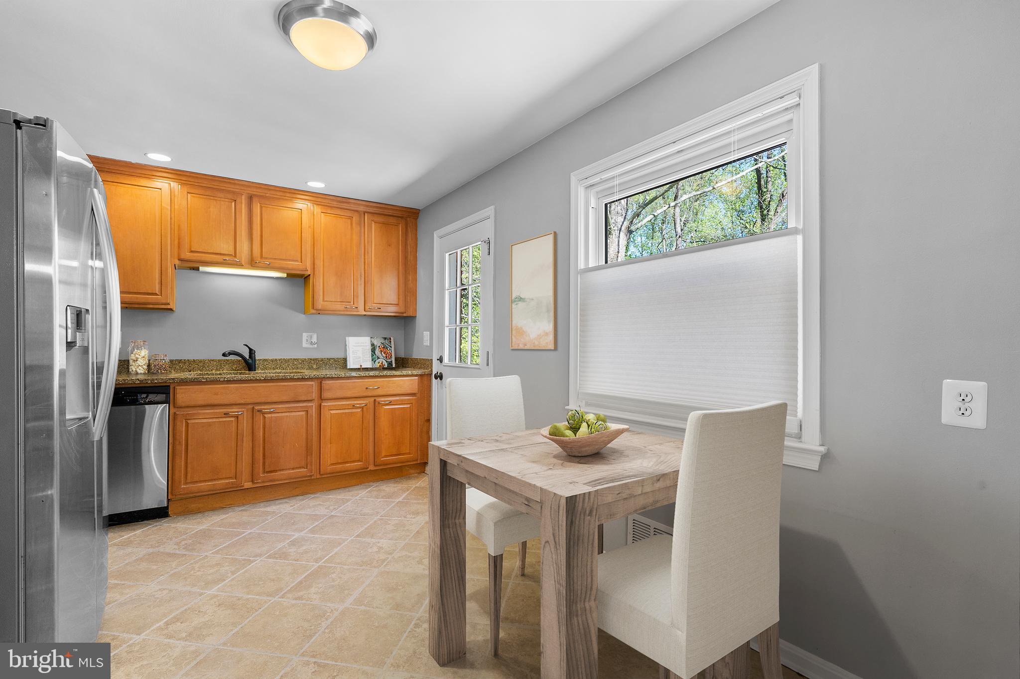 1603 Kirby Road McLean, VA 22101 - Photo 4 of 38 a kitchen with a sink cabinets and window