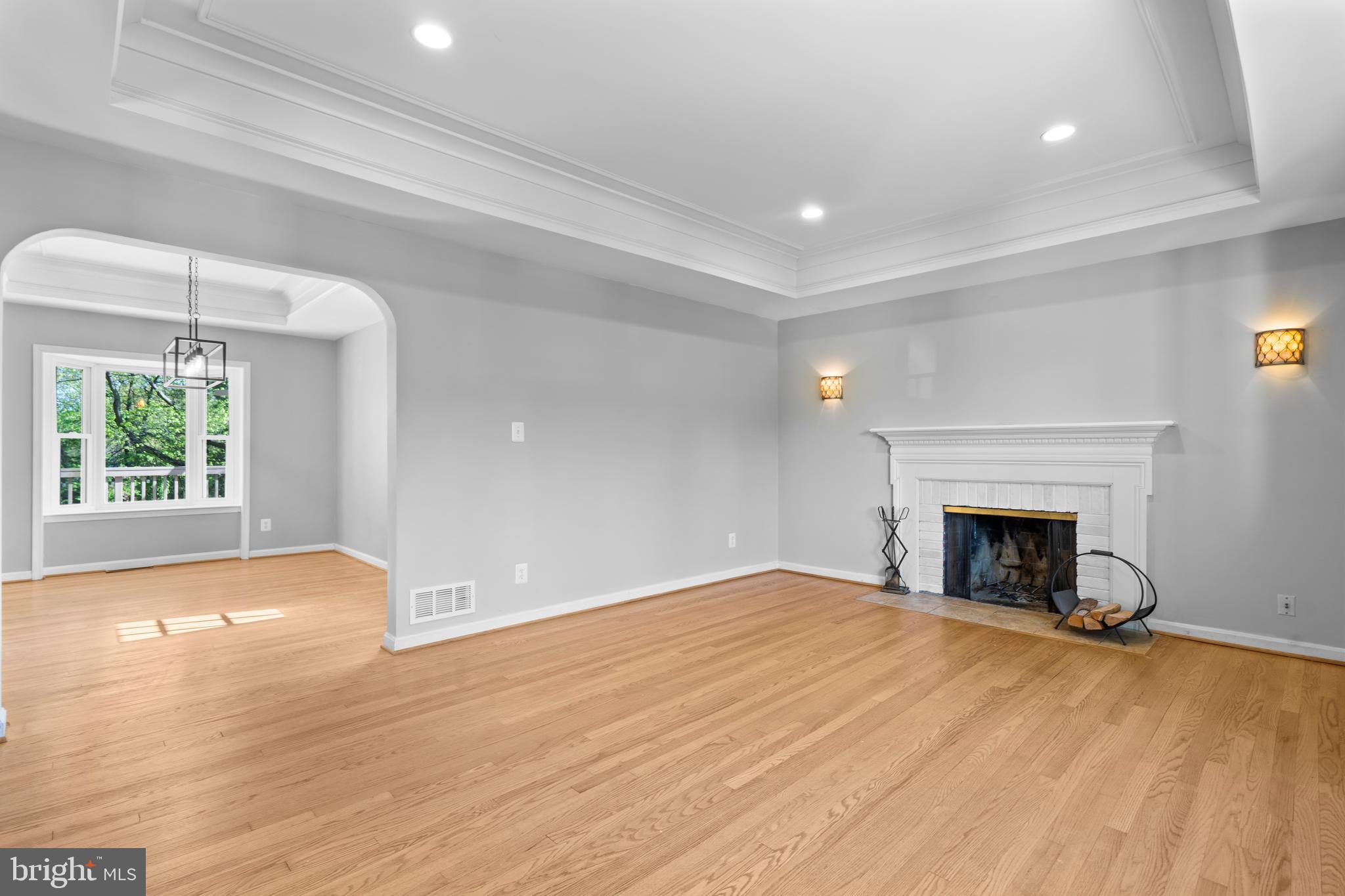 1603 Kirby Road McLean, VA 22101 - Photo 6 of 38 a view of an empty room with window and fire place