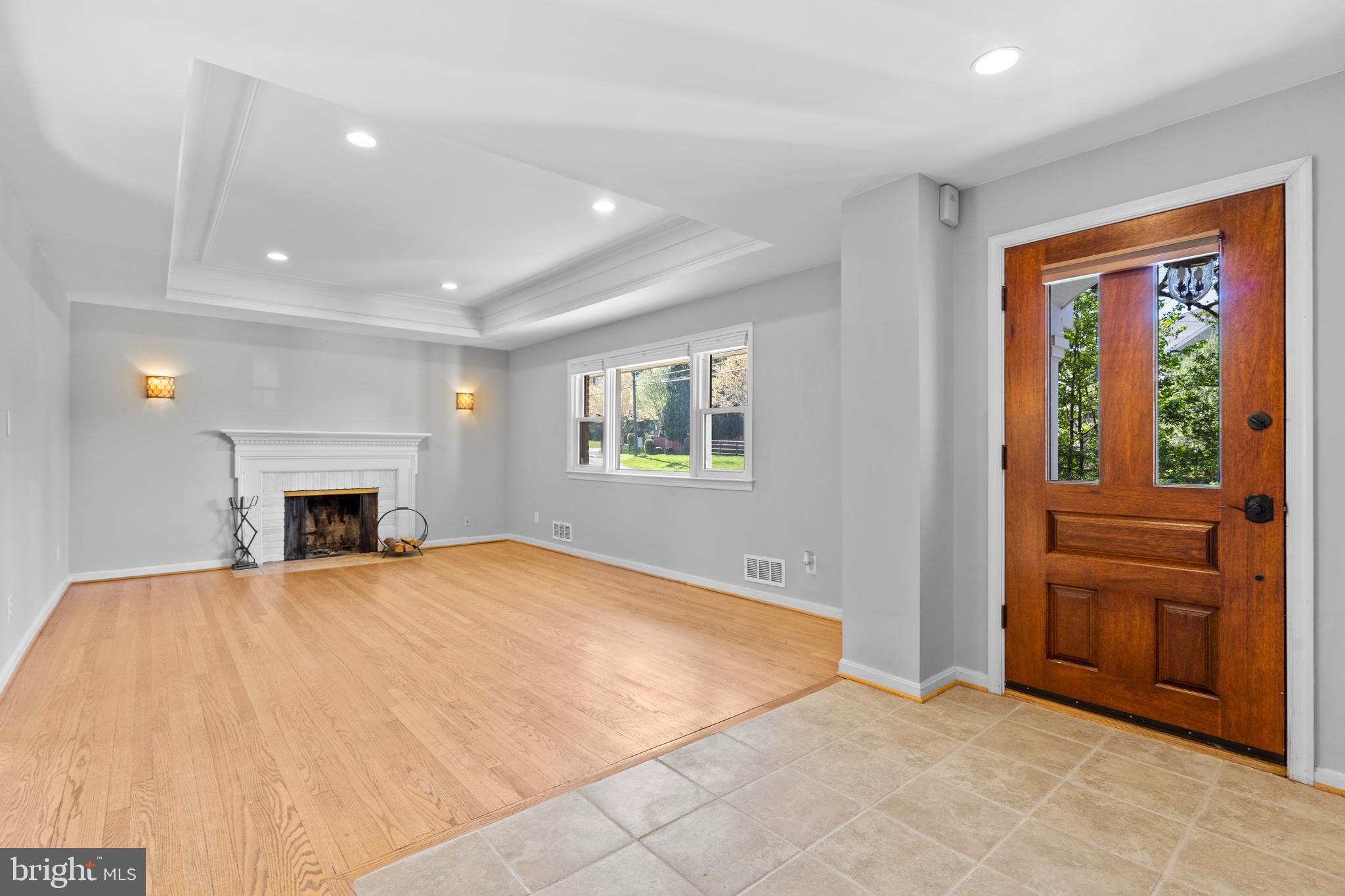 1603 Kirby Road McLean, VA 22101 - Photo 7 of 38 a view of an empty room with window and fire place