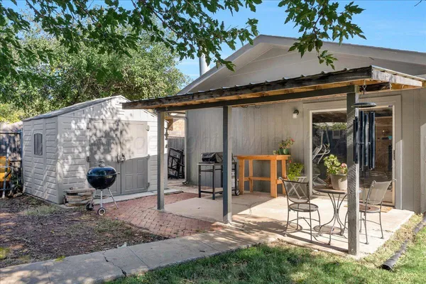 a view of a barn with a yard