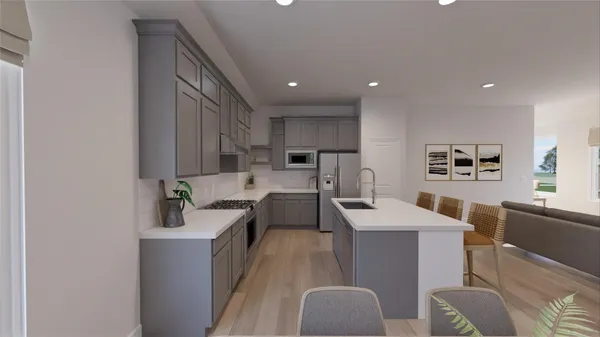 a dining room with kitchen island granite countertop wooden floor stainless steel appliances and dining table