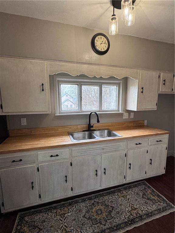 504 Emerson Avenue Farrell, PA 16121 - Photo 16 of 24 a bathroom with a double vanity sink and mirror