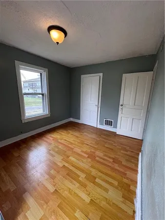 a bathroom with a tub and shower