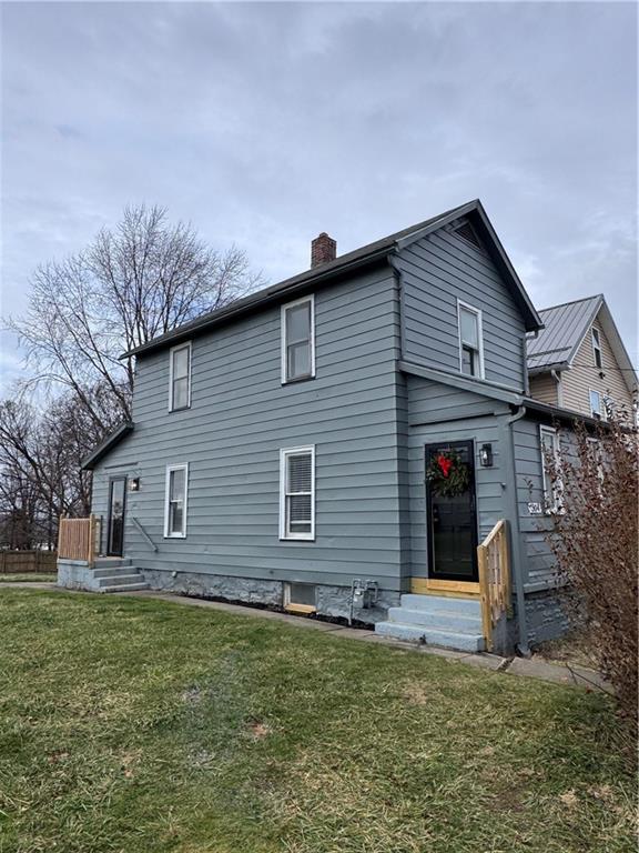 504 Emerson Avenue Farrell, PA 16121 - Photo 5 of 24 a front view of a house with a yard