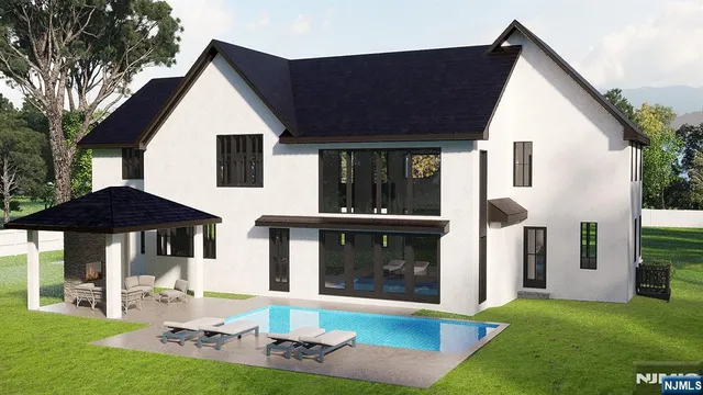 a front view of house with yard outdoor seating and barbeque oven