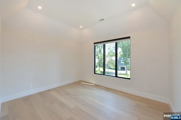 an empty room with a bench