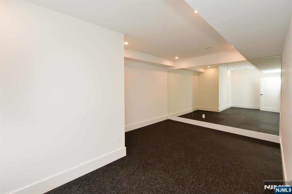 3 Central Avenue Demarest, NJ 07627 - Photo 38 of 49 an empty room with a bench