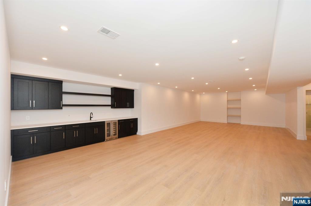 3 Central Avenue Demarest, NJ 07627 - Photo 44 of 49 a large white kitchen with a large sink