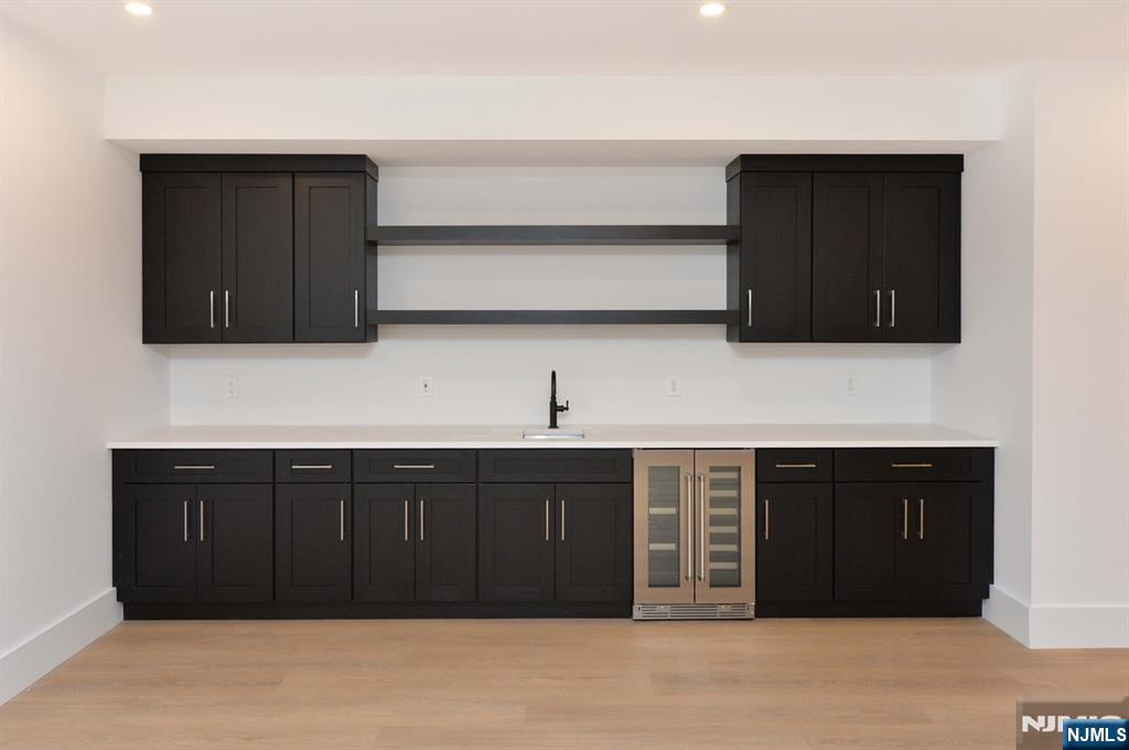 3 Central Avenue Demarest, NJ 07627 - Photo 45 of 49 a kitchen with a sink and cabinets