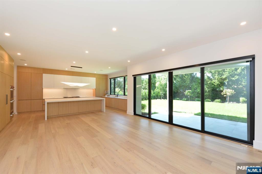 3 Central Avenue Demarest, NJ 07627 - Photo 9 of 49 a view of empty room with wooden floor and fan
