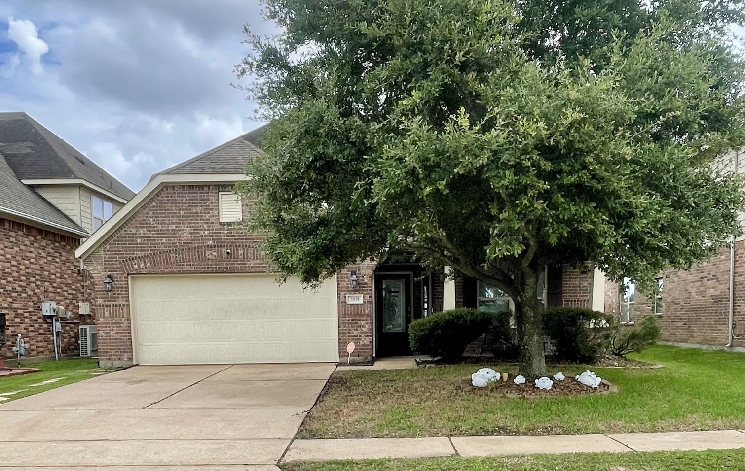 5939 Northcrest Village Way Spring, TX 77388 - Photo 1 of 12 front view of a house with a yard
