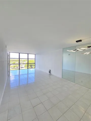 an empty room with natural light