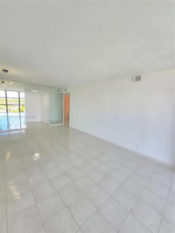 a view of large windows and an outdoor space