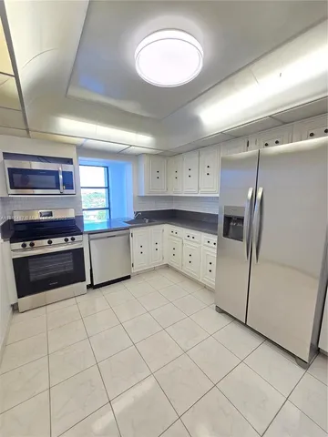 a room with a bed and a window