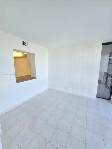 a view of entryway with stairs and wooden floor