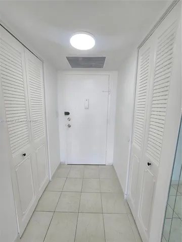 a view of a an empty room and window