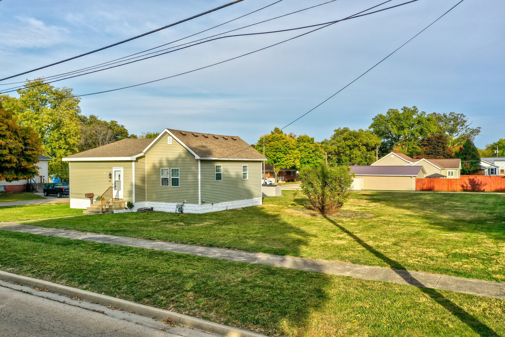 401 South 5th Avenue Streator, IL 61364 - Photo 4 of 17 a view of a big house with a big yard and potted plants