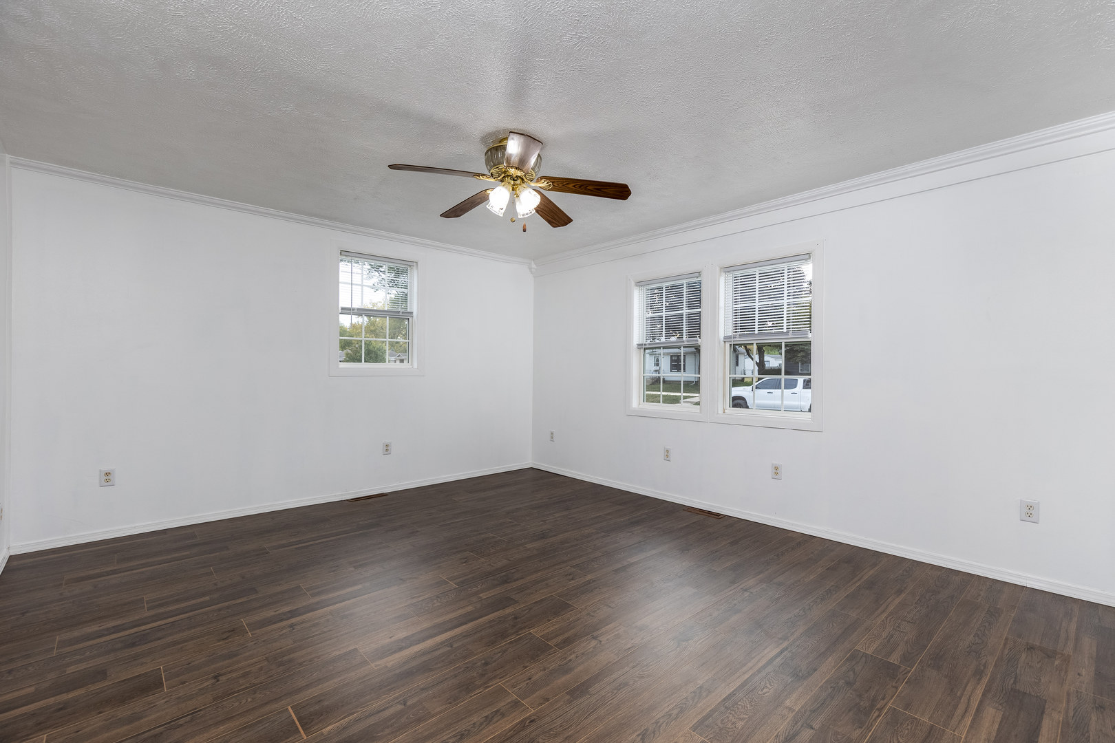 401 South 5th Avenue Streator, IL 61364 - Photo 6 of 17 a view of empty room with wooden floor