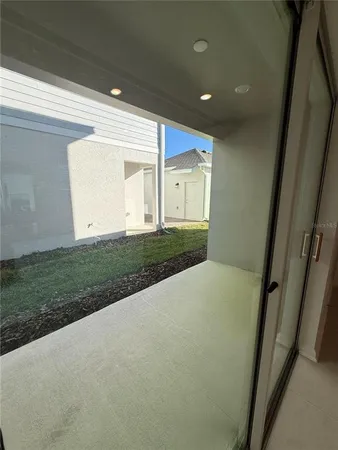 a view of a house with a yard and garage