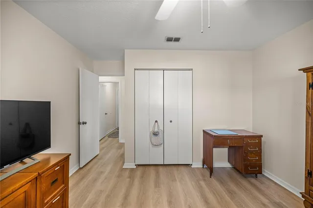 a view of a livingroom with wooden floor