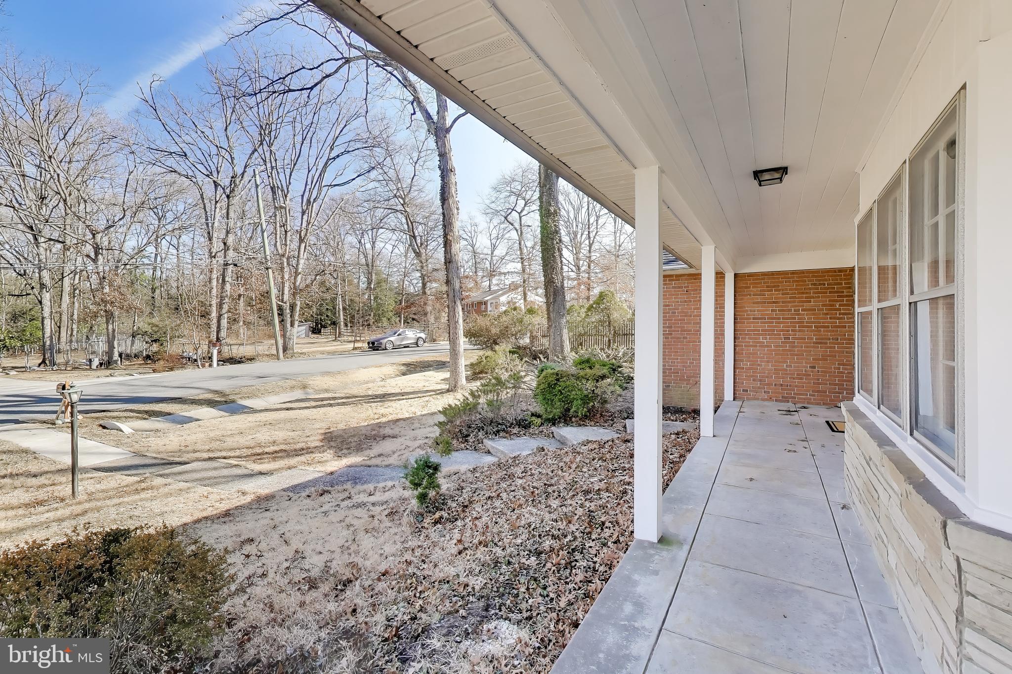 4007 Harrison Road Beltsville, MD 20705 - Photo 4 of 49 a view of a garden from a porch