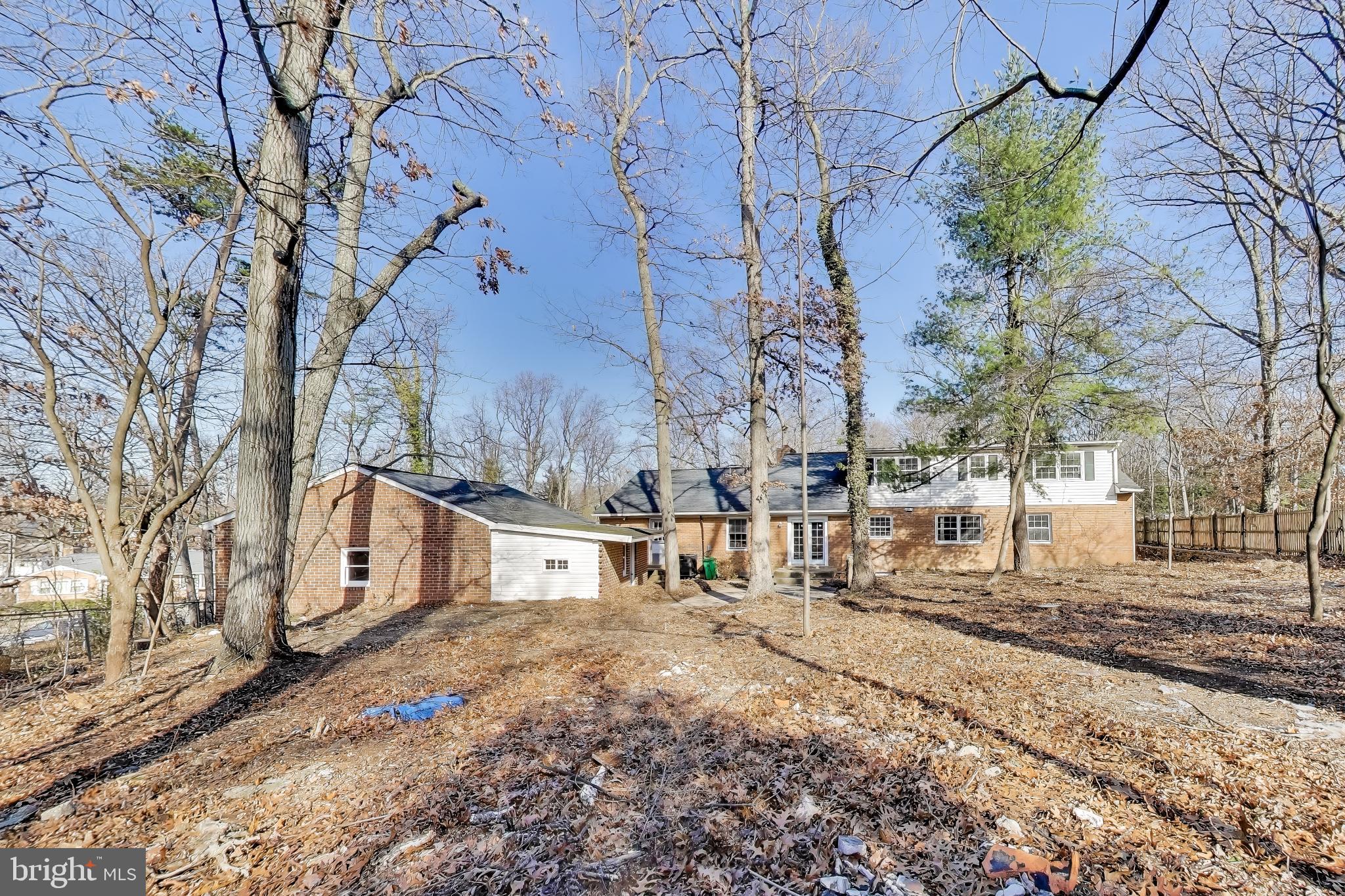 4007 Harrison Road Beltsville, MD 20705 - Photo 43 of 49 a view of a yard with snow on the road
