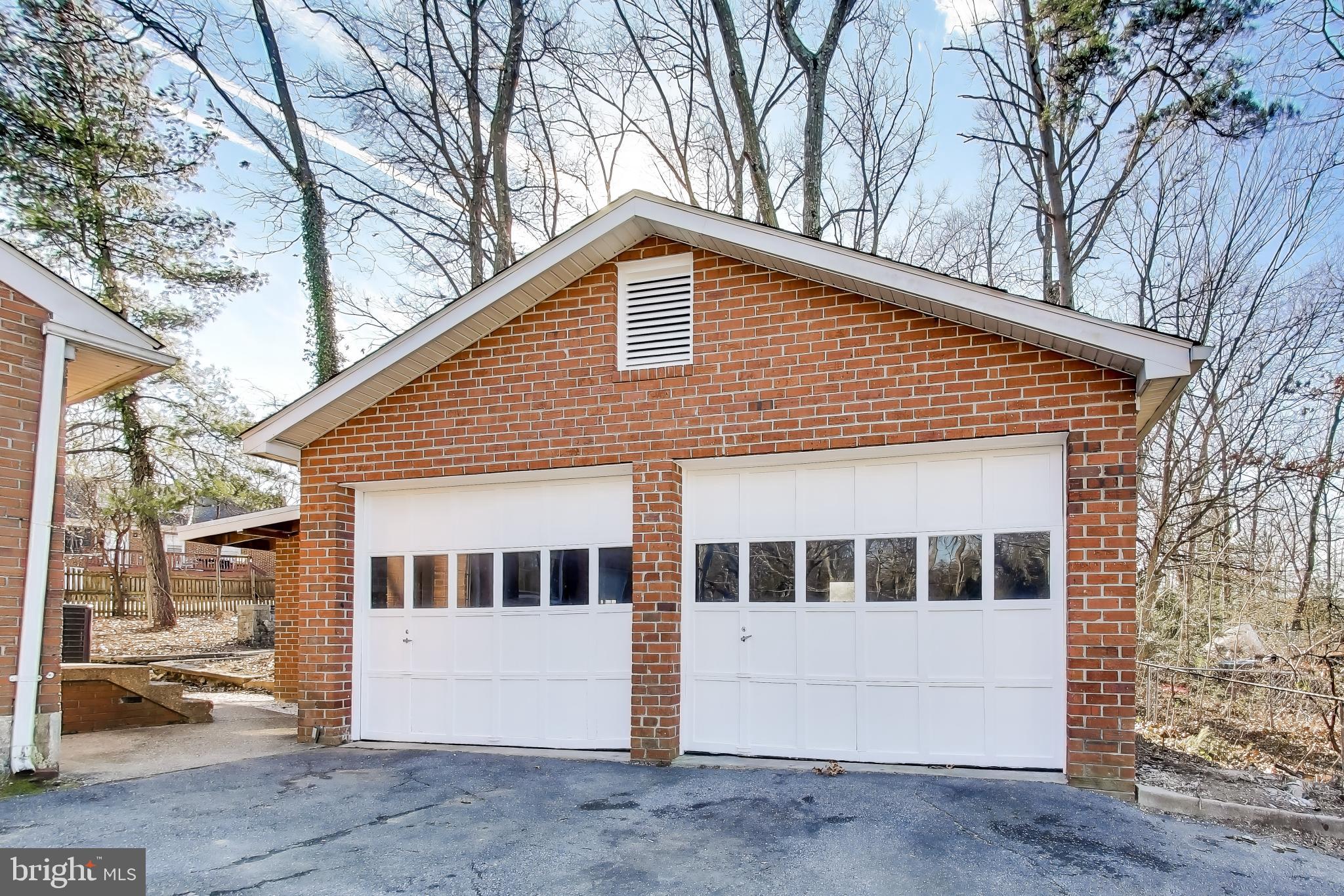 4007 Harrison Road Beltsville, MD 20705 - Photo 45 of 49 a view of house with a yard and large tree