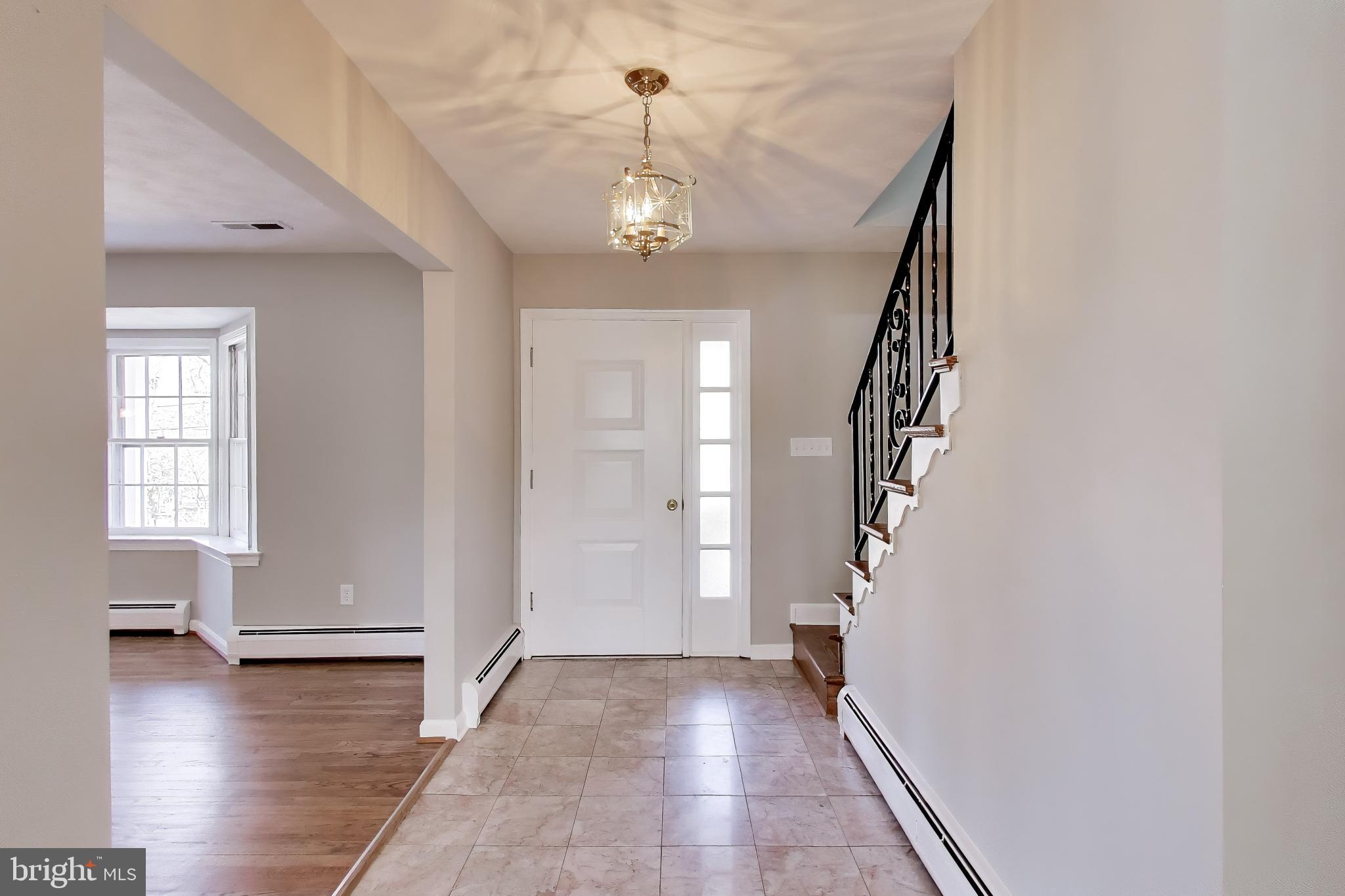 4007 Harrison Road Beltsville, MD 20705 - Photo 5 of 49 a view of entryway with wooden floor