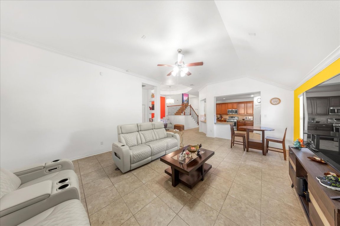 349 Razzmatazz Trail Buda, TX 78610 - Photo 22 of 40 a living room with furniture and a flat screen tv