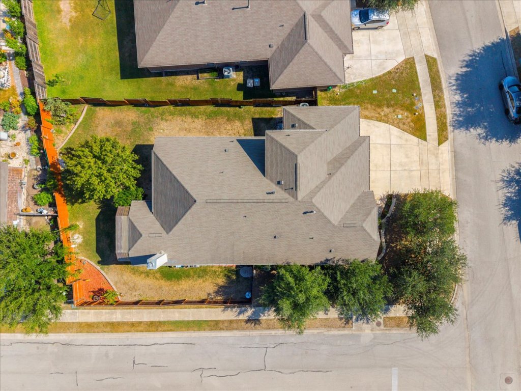 349 Razzmatazz Trail Buda, TX 78610 - Photo 7 of 40 an aerial view of a house with a yard