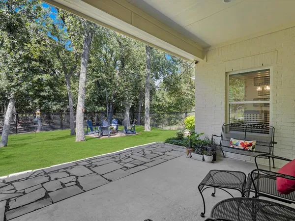 a garden view with a seating space