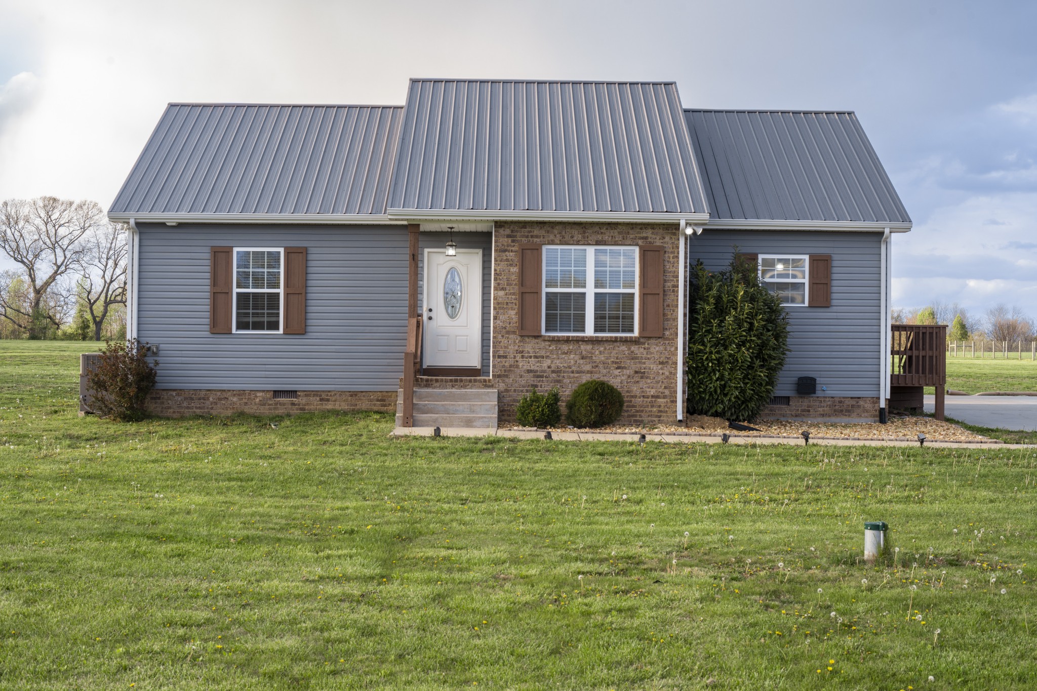 4982 Hyde Road Springfield, TN 37172 - Photo 1 of 17 a front view of a house with a yard