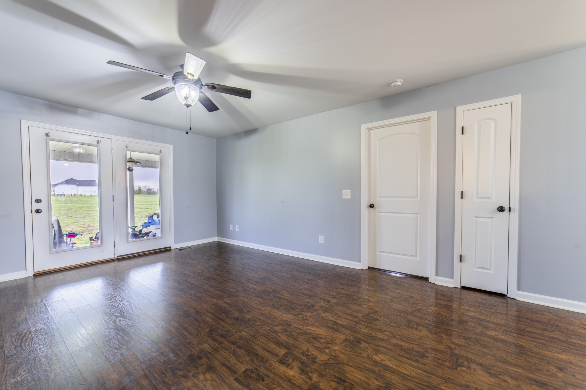 4982 Hyde Road Springfield, TN 37172 - Photo 6 of 17 a view of an empty room with window and wooden floor